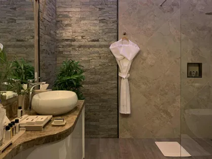 Nature-Infused Luxury Bathroom — Stone, Wood & Serenity at Montrose Golf Resort